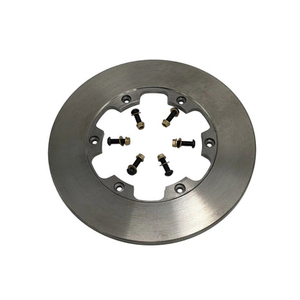 Metallic brake rotor with nuts and bolts on a white background