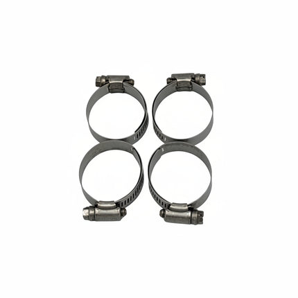 Four metal hose clamps on a white background