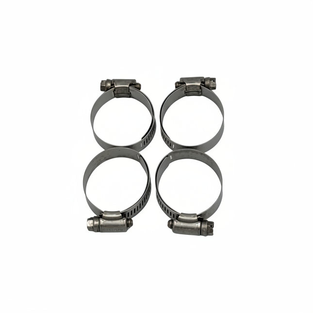 Four metal hose clamps on a white background