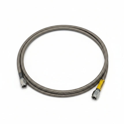 Metal cable with a yellow end on a white background